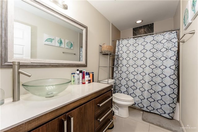 bathroom featuring toilet, tile patterned floors, a shower with shower curtain, and vanity