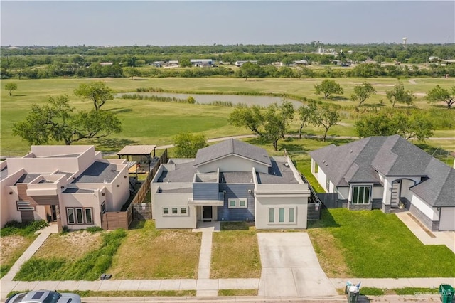 aerial view with a water view and a residential view