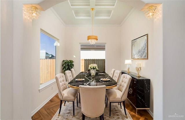 dining area featuring a notable chandelier, a wealth of natural light, and parquet floors