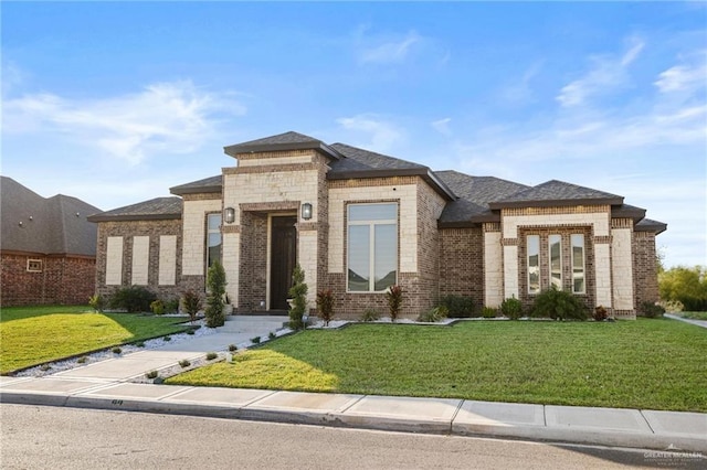 1110 Raptor St, Palmview, TX 78572 - view of front of property featuring a front yard, brick siding, and a shingled roof