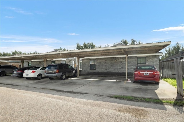 view of car parking featuring a carport