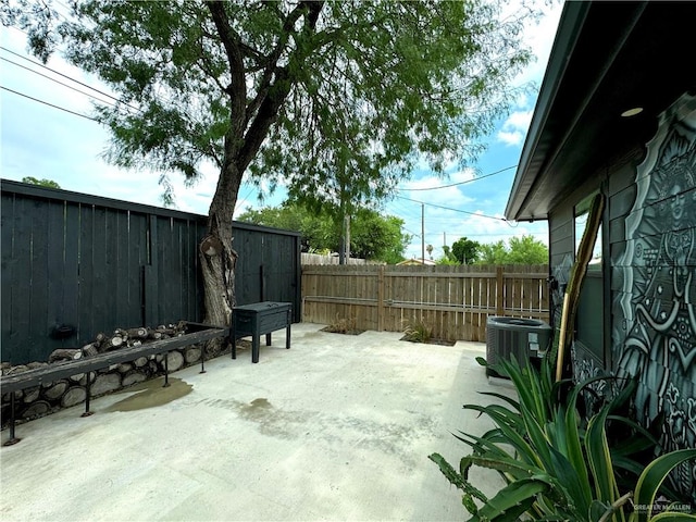 view of patio with central AC