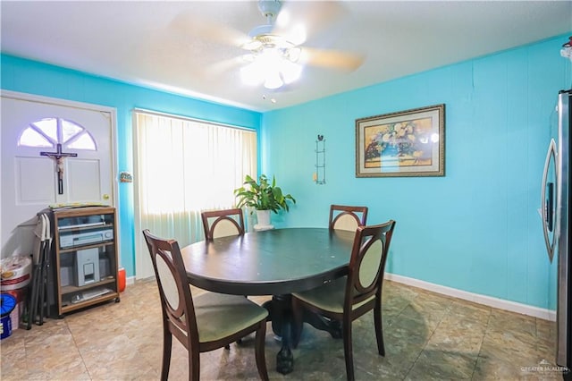 dining room with ceiling fan