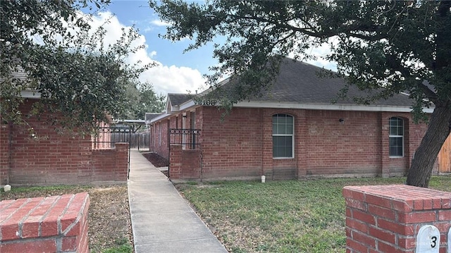 view of property exterior featuring a yard