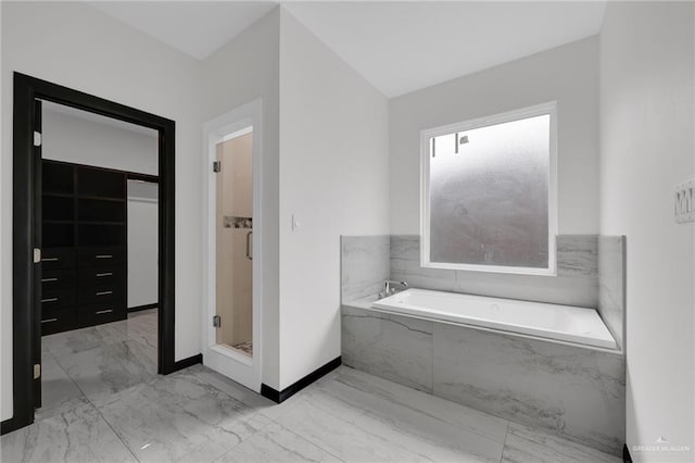 4120 Wisteria Ave, Mcallen, TX 78504 - bathroom with marble finish floors, a garden tub, a shower stall, and baseboards