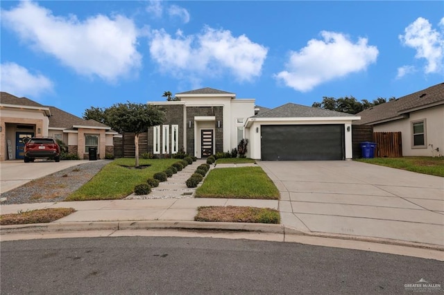 4120 Wisteria Ave, Mcallen, TX 78504 - prairie-style home featuring driveway and stucco siding
