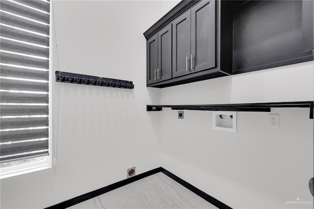 4120 Wisteria Ave, Mcallen, TX 78504 - laundry room with hookup for an electric dryer, hookup for a washing machine, baseboards, and cabinet space