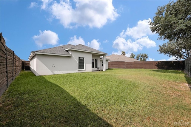 4120 Wisteria Ave, Mcallen, TX 78504 - rear view of house featuring stucco siding and roof with shingles