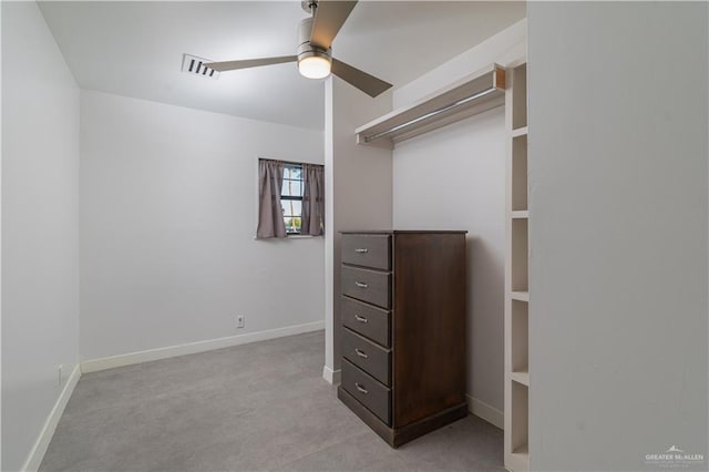 spacious closet featuring ceiling fan