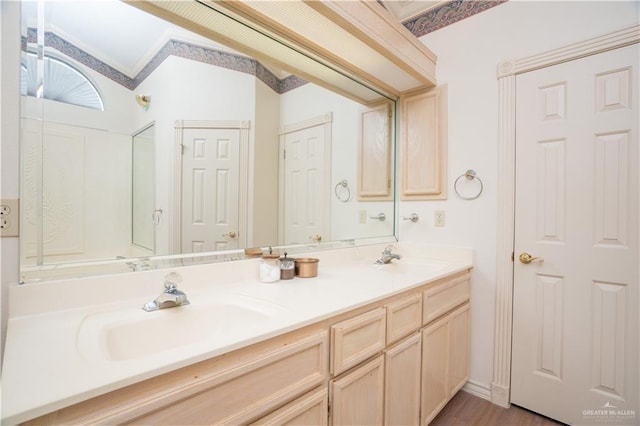 501 W Esperanza Ave, Mcallen, TX 78501 - full bathroom with double vanity and wood finished floors
