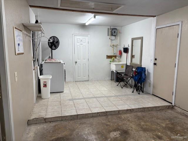 interior space featuring washer / clothes dryer and sink