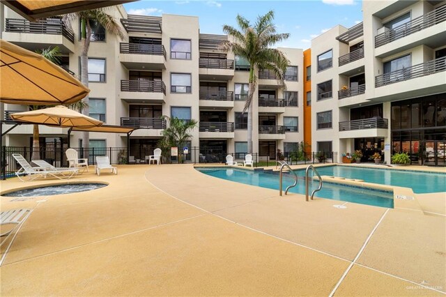 813 Travis St Unit 419, Mission, TX 78572 - community pool featuring fence