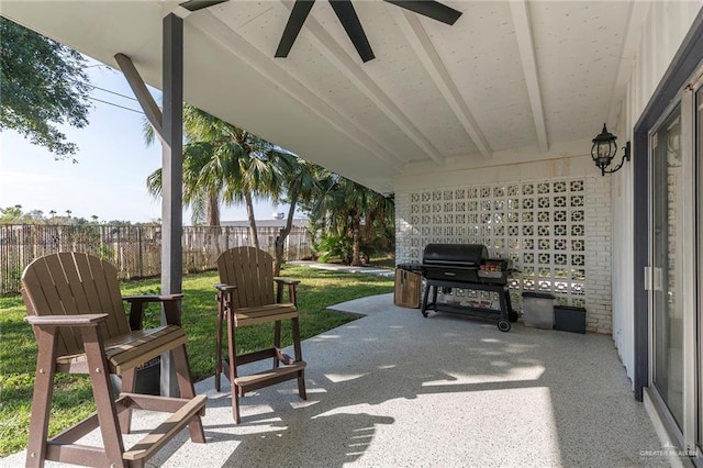 view of patio / terrace with ceiling fan and a grill