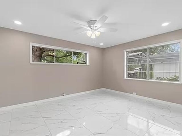 empty room with ceiling fan