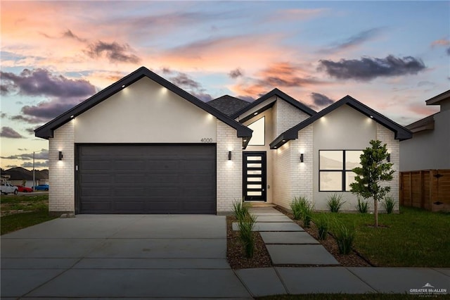 view of front of property with a garage