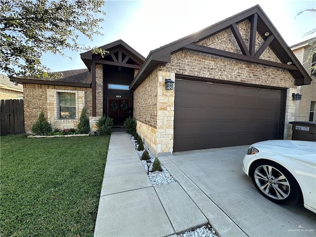 view of front of house featuring a garage and a front lawn