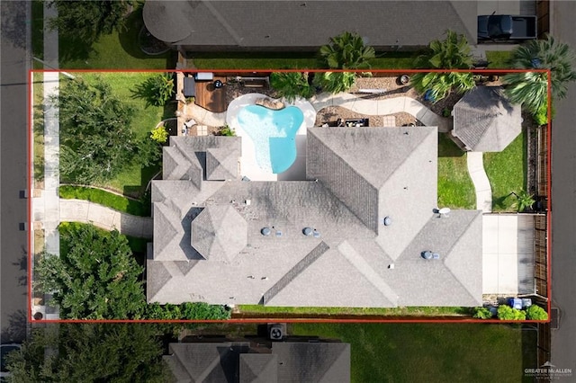 aerial view of property's location featuring a pool area and property parcel outlined