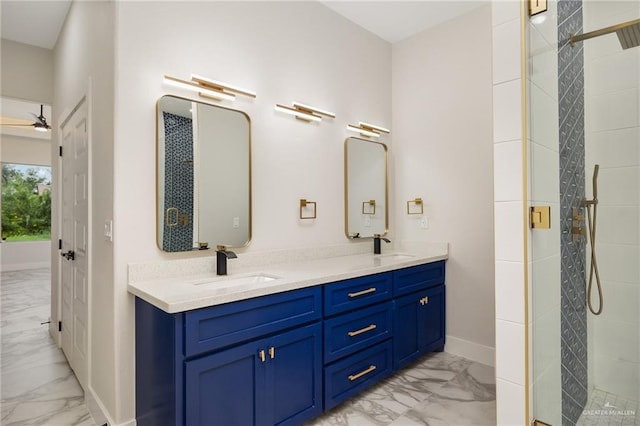 2313 Champion Ave, Donna, TX 78537 - bathroom with vanity, ceiling fan, and a shower with shower door