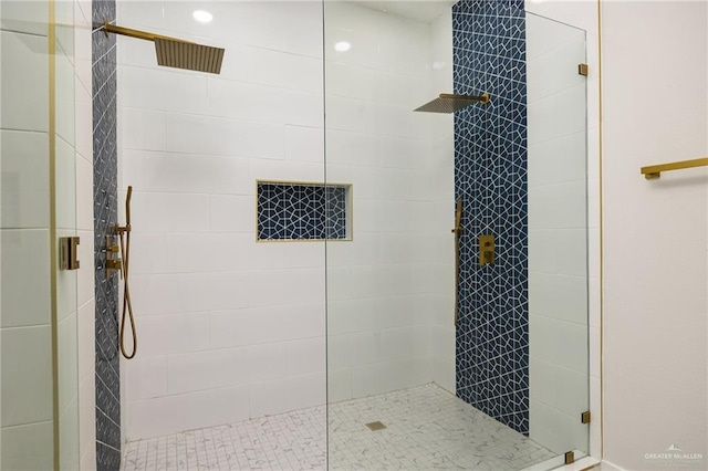 bathroom with an enclosed shower