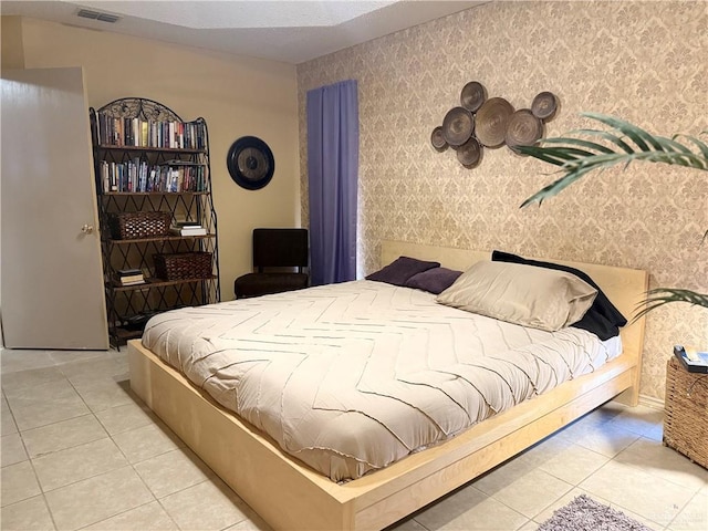 2612 Ashley Dr, Pharr, TX 78577 - bedroom with wallpapered walls and tile patterned flooring