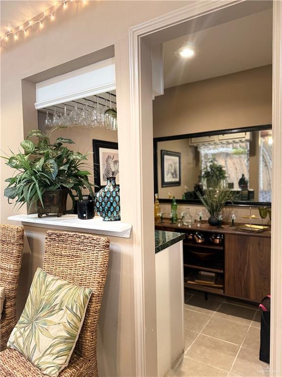 2612 Ashley Dr, Pharr, TX 78577 - indoor wet bar featuring light tile patterned floors