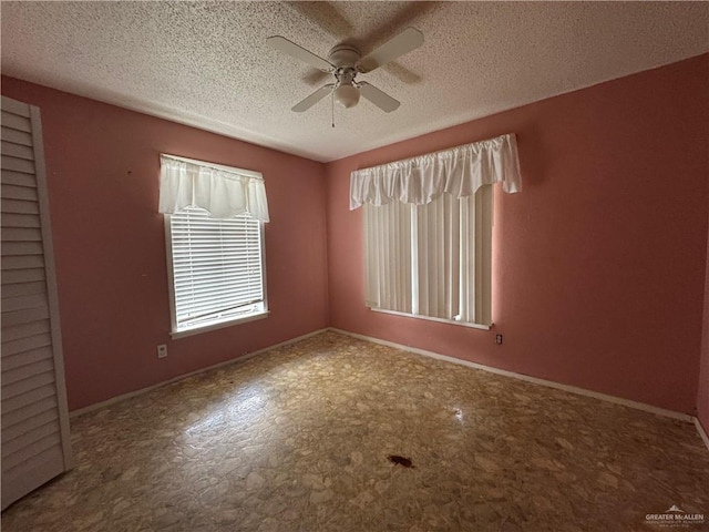 814 N Pino St, Weslaco, TX 78596 - unfurnished room with ceiling fan, a textured ceiling, and baseboards