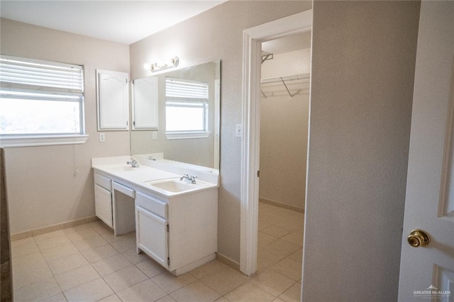 bathroom with vanity and tile patterned floors