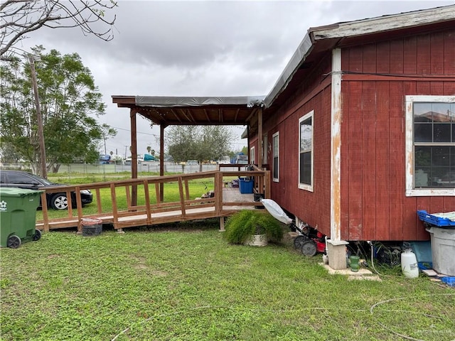 view of yard with a wooden deck