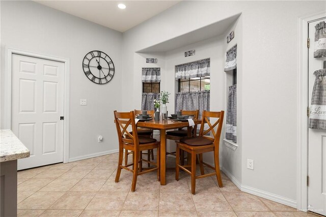 1612 W Military Hwy, Mission, TX 78572 - dining area with light tile patterned floors, baseboards, and recessed lighting
