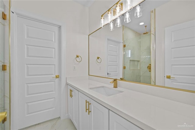 full bathroom with a marble finish shower, marble finish floor, and vanity