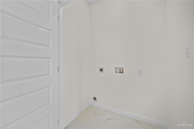 clothes washing area with electric dryer hookup, marble finish floor, baseboards, hookup for a washing machine, and laundry area