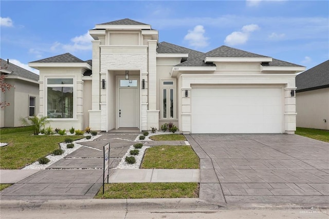 1011 Magnolia St, Mission, TX 78573 - prairie-style house with a garage, roof with shingles, driveway, stucco siding, and a front lawn