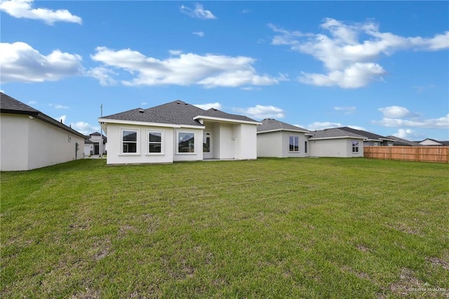 1011 Magnolia St, Mission, TX 78573 - back of property with stucco siding