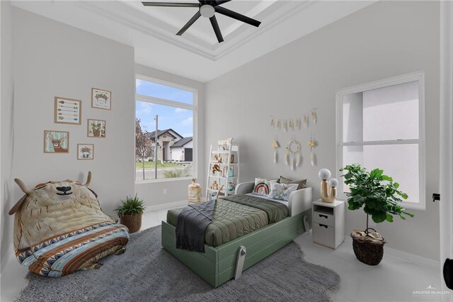 1011 Magnolia St, Mission, TX 78573 - bedroom with a tray ceiling, ornamental molding, and a ceiling fan