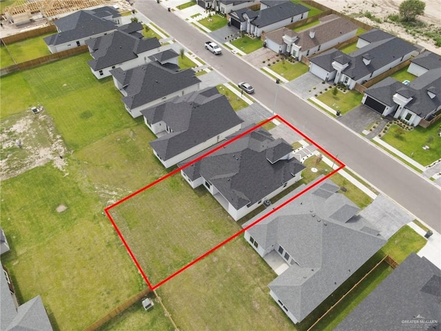 1011 Magnolia St, Mission, TX 78573 - aerial perspective of suburban area with property parcel outlined