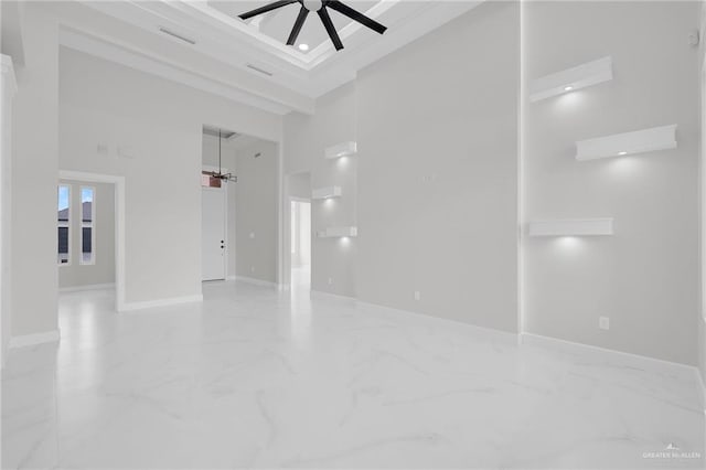 1011 Magnolia St, Mission, TX 78573 - unfurnished room featuring a towering ceiling, a ceiling fan, and marble tiled floors