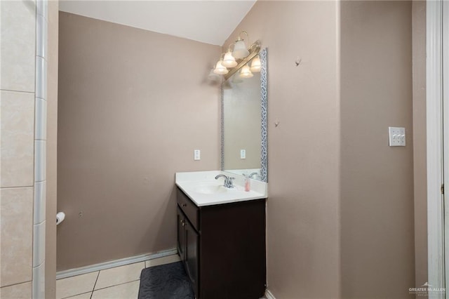 full bathroom featuring tile patterned flooring, vanity, and baseboards