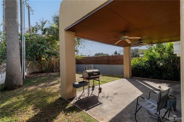 view of patio / terrace with area for grilling and ceiling fan