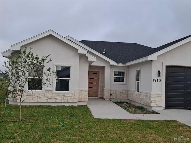 view of front of home with stucco siding, stone siding, roof with shingles, a front lawn, and an attached garage