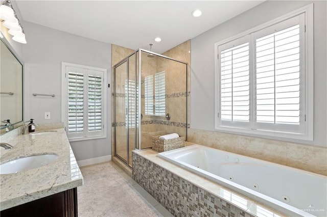 9325 W Mile 8 Rd, Mission, TX 78573 - bathroom with a whirlpool tub, a shower stall, double vanity, tile patterned floors, and recessed lighting