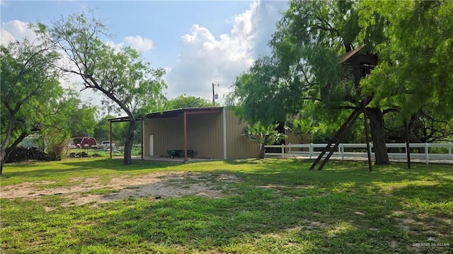 9325 W Mile 8 Rd, Mission, TX 78573 - view of yard featuring a pole building and an outbuilding
