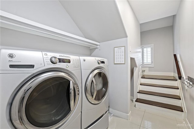 9325 W Mile 8 Rd, Mission, TX 78573 - laundry area with washing machine and clothes dryer, light tile patterned floors, and baseboards