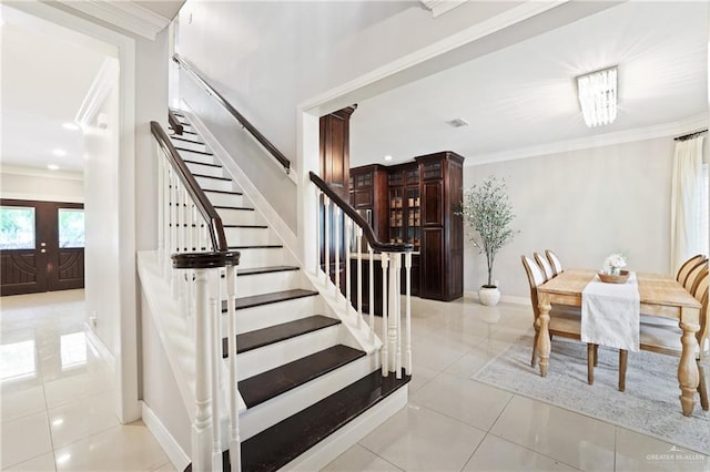 9325 W Mile 8 Rd, Mission, TX 78573 - staircase featuring crown molding, tile patterned floors, and baseboards