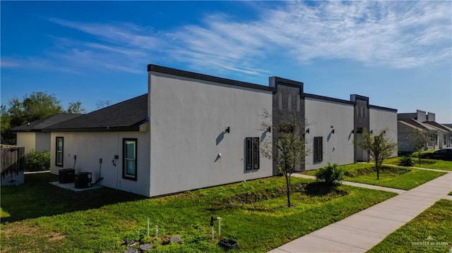 view of property exterior with a yard