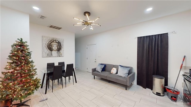 living room featuring a chandelier