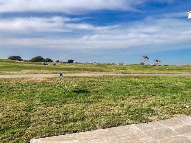 view of yard with a rural view