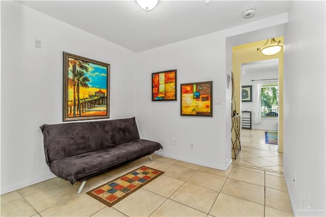 sitting room with light tile patterned flooring