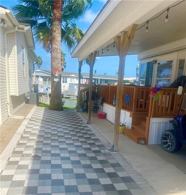 view of patio featuring central AC unit