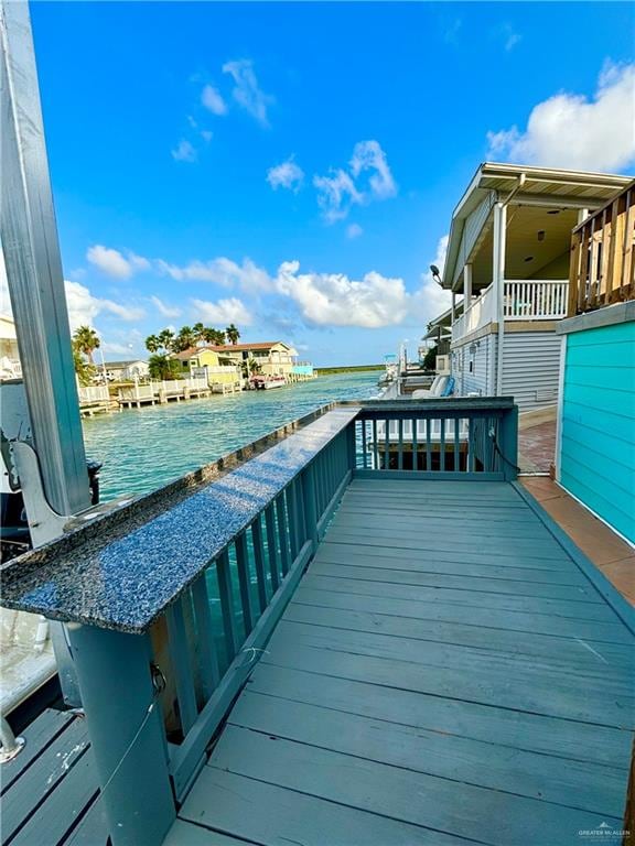 dock area with a water view