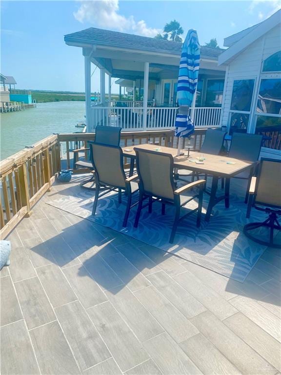 view of patio featuring a water view